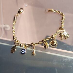 Gold-Plated Charm Bracelet with Evil Eye and Elephant